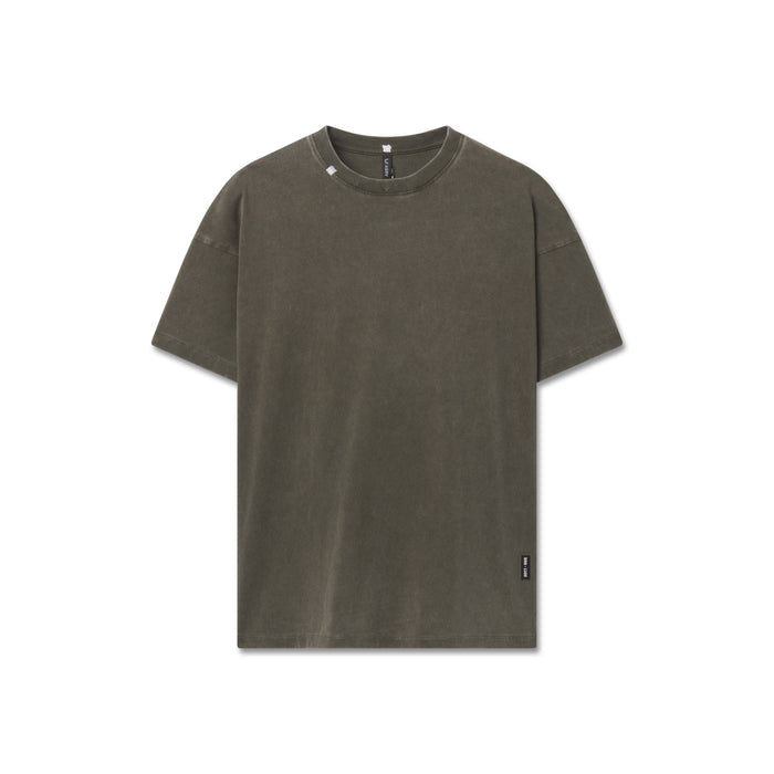 Flatlay of distressed relaxed tee in olive, front view on white background