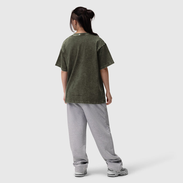 Distressed Relaxed Tee in olive worn with grey joggers, back view