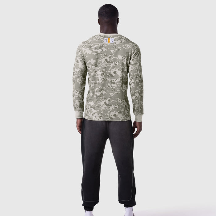 Digital camo waffle knit longsleeve worn with black joggers, back view