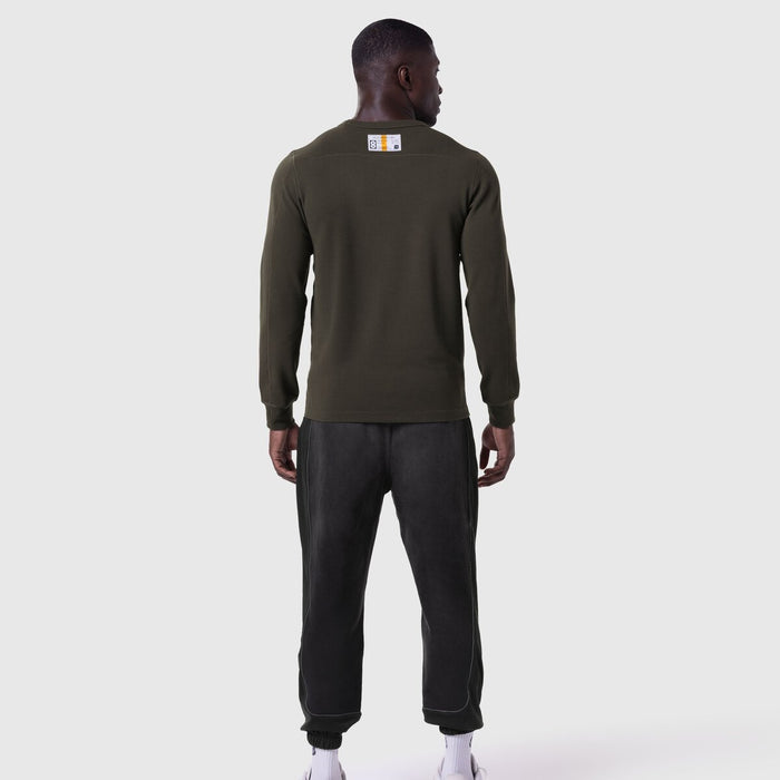 Waffle knit longsleeve in olive worn by model, back view