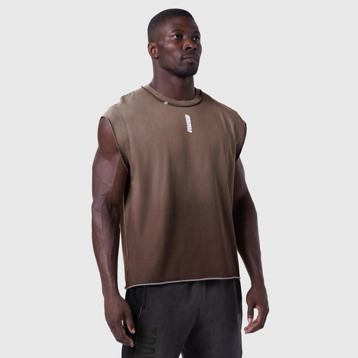Tech Essential Cap Shoulder Cutoff sleeveless tank in dark earth, worn by model, front view