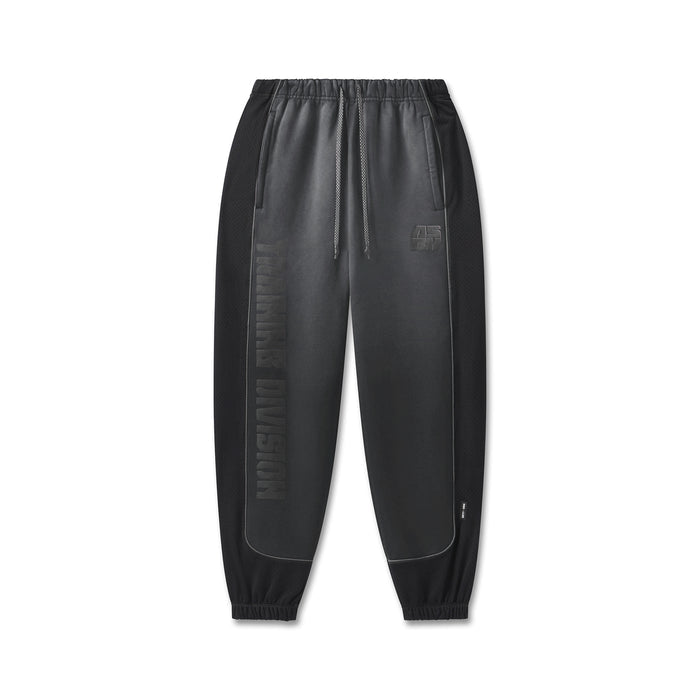 flatlay of black Tech-Terry Mesh Panel Sweats joggers with mesh side panels, front view