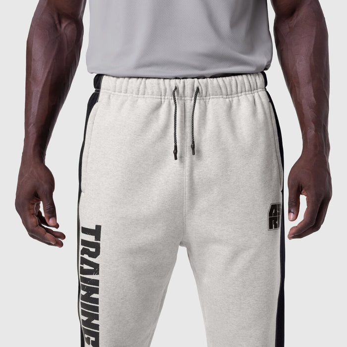 Tech-Terry Mesh Panel Sweats in heather grey with black side panels, worn by model, front view