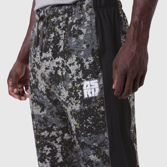 Tech-Terry Mesh Panel Sweats in pixel camo, worn by model showing side detail