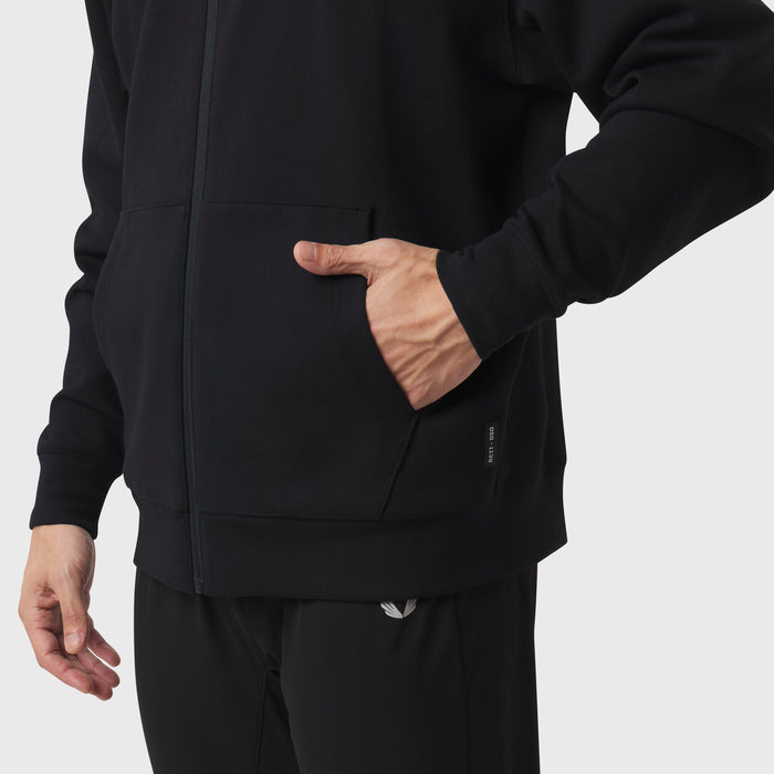 Dri-Core™ Sidelock Full Zip hoodie in black, model wearing with hand in pocket