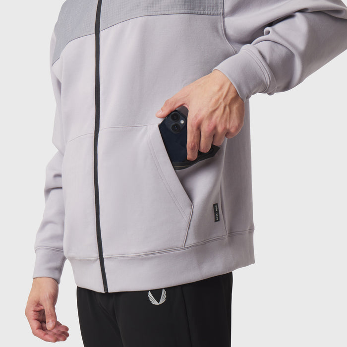 Dri-Core Sidelock Full Zip hoodie in slate grey, model holding phone in pocket