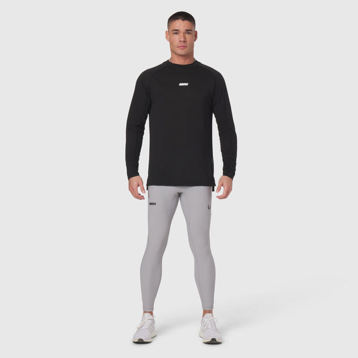 Polartec® Delta Longsleeve in black worn with grey leggings, front view