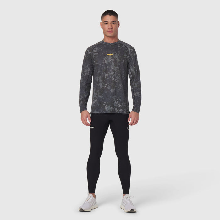 Polartec® Delta Longsleeve in pixel camo gray, styled with black leggings on model