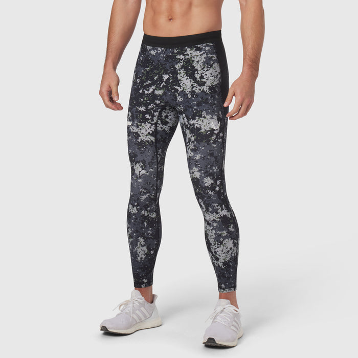 Lycra Ribbed Running Tight in pixel camo, worn by model with white sneakers