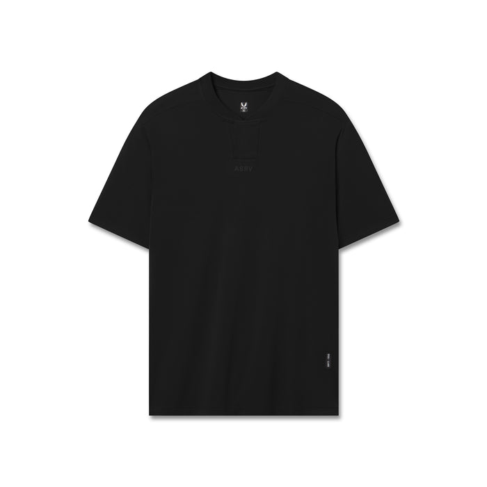 Black short-sleeve t-shirt on dress form, front view flatlay