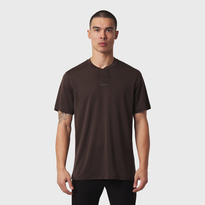 Dark Earth Polartec Delta polo worn by male model, front view