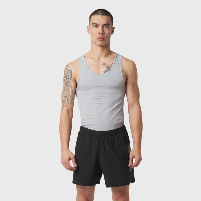 LYCRA® ADAPTIV Baselayer Tank in slate grey worn by model, front view