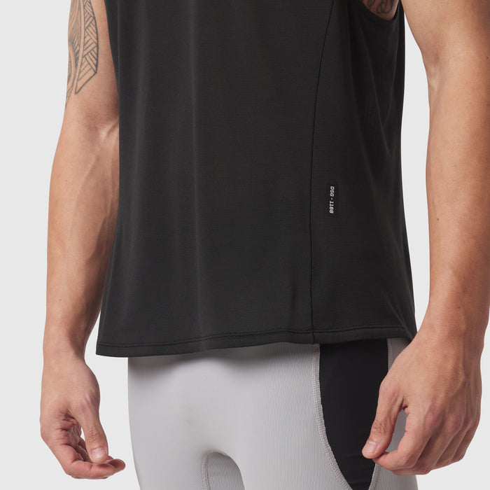 Black Polartec® Delta Singlet worn by model, front side view showing fit and fabric