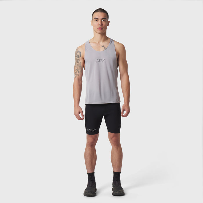 Polartec® Delta Singlet in slate grey worn by male model with black shorts, front view
