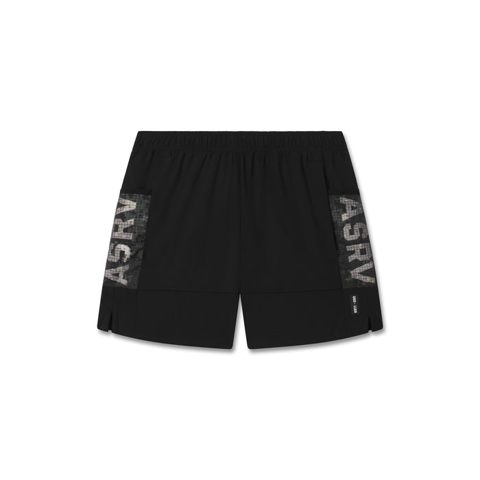Flatlay of Tetra-Lite® Adventure Short in black with mesh side panels, shot from above