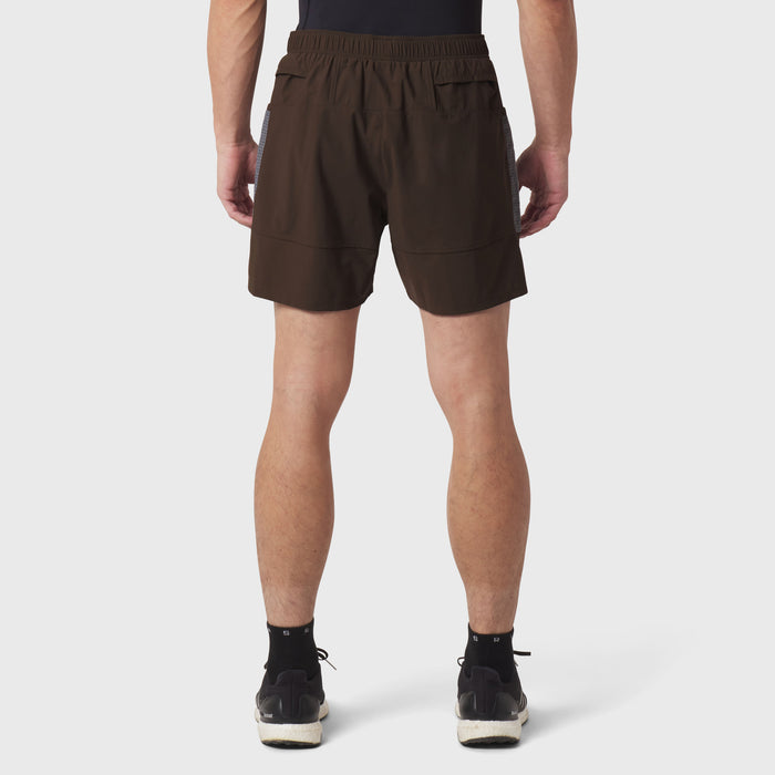 Tetra-Lite® Adventure Short in Dark Earth, rear view on model wearing black socks and sneakers