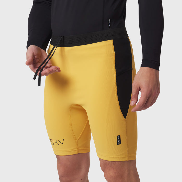 Lycra® Ribbed Run Half-Tight shorts in amber yellow, worn by model, front view