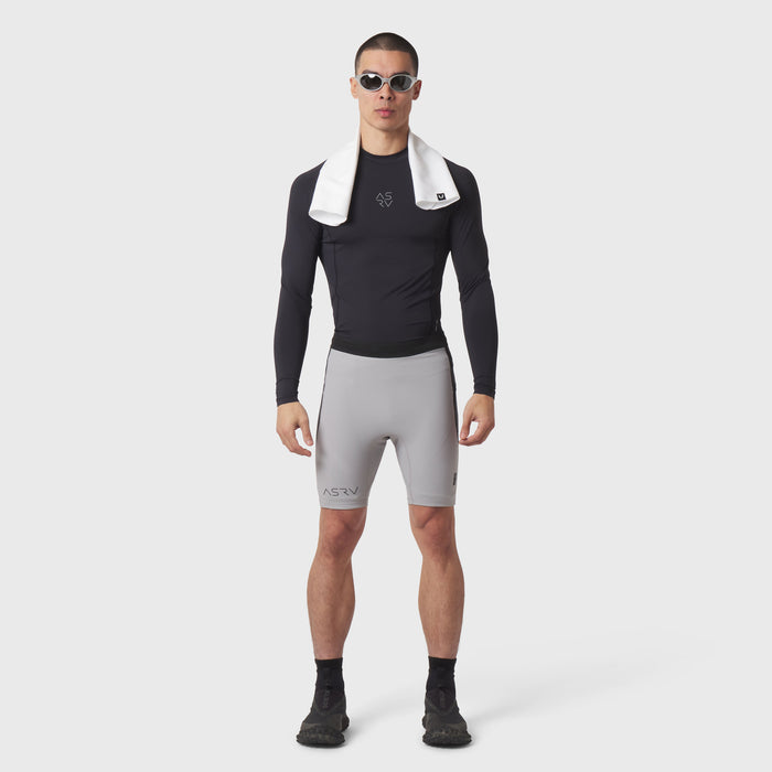 Lycra® Ribbed Run Half-Tight in slate grey, modeled with black long-sleeve top and white collar