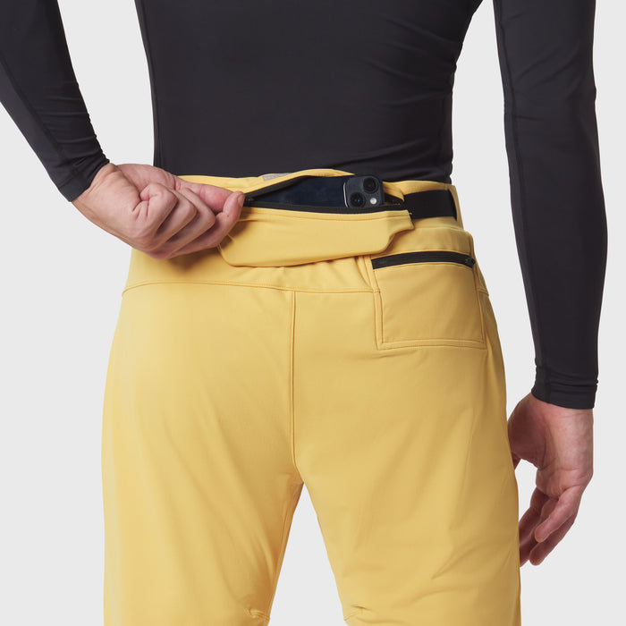 Hybrid Belt-Pack Run Jogger in amber yellow worn by model, side view showing belt pack detail
