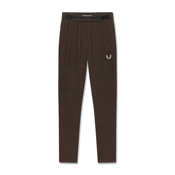 Flatlay of Hybrid Belt-Pack Run Jogger in dark earth brown, front view