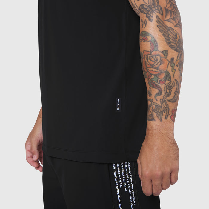 Laser-Vent™ Training Tee in black worn by model, side view showing sleeve and torso
