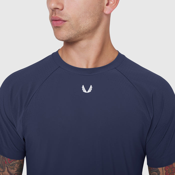 Laser-Vent Training Tee in navy worn by model, front view with small white logo