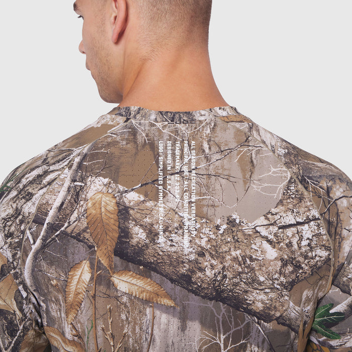 Laser-Vent Training Tee in Realtree Edge camo, back view on model