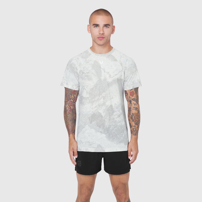 Laser-Vent Training Tee in white camo, front view on model with black shorts