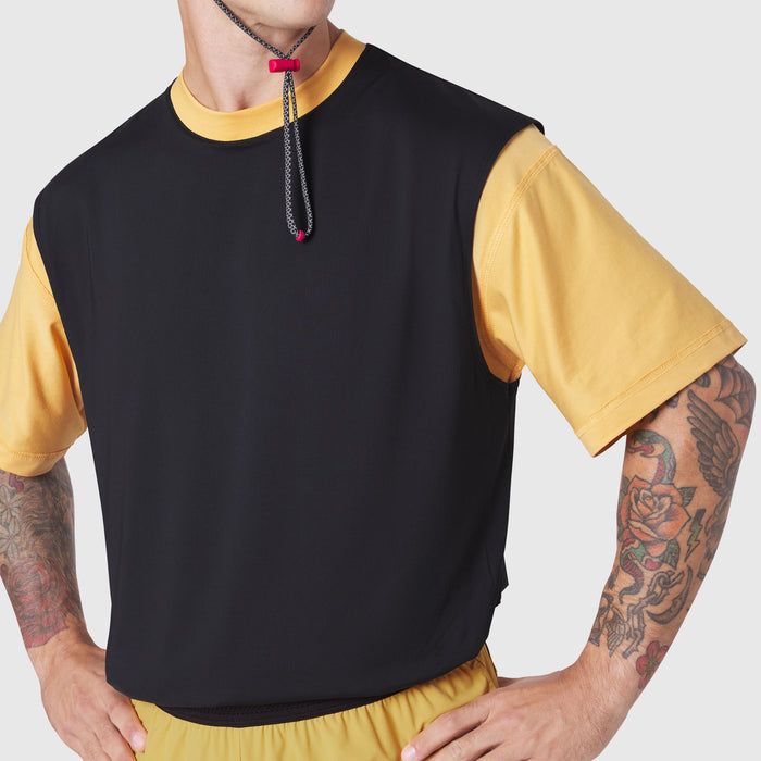 Supima Ice-Skin Reversible Tee in amber and black worn by model, front view