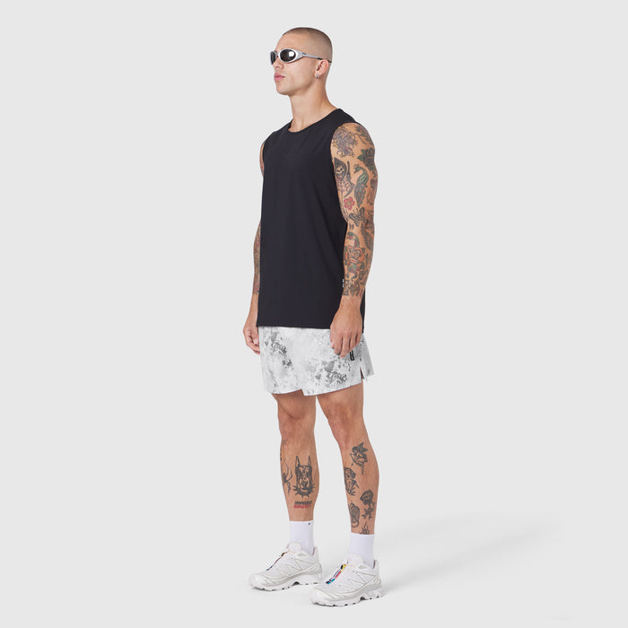 Black Warpflexx-Lite Training Tank worn with white shorts, side view on model