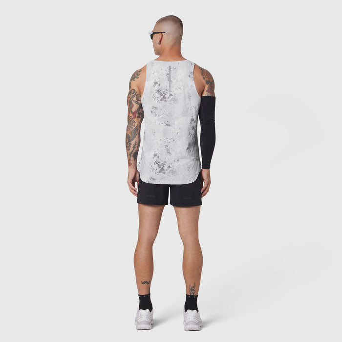Aerotex Perforated Run Tank in Sedona Snow Camo, worn by model from back, paired with black shorts