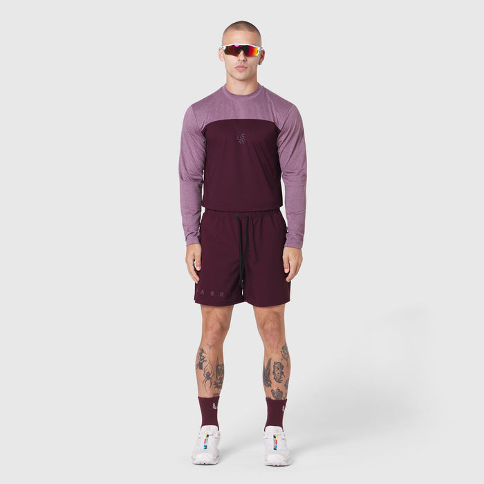 AEROSILVER® UPF50+ Run Long Sleeve in merlot and mauve, worn with matching shorts, front view