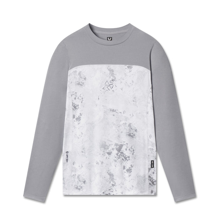 AEROSILVER® UPF50+ Run Long Sleeve in gray and white snow camo, front view on model flatlay