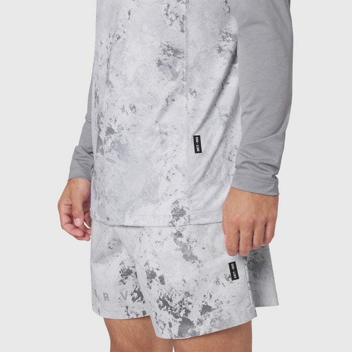 AEROSILVER® UPF50+ Run Long Sleeve in Sedona Snow Camo worn by model, side view