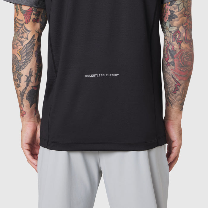 AEROSILVER® UPF50+ Run Tee in black, worn by tattooed model, back view