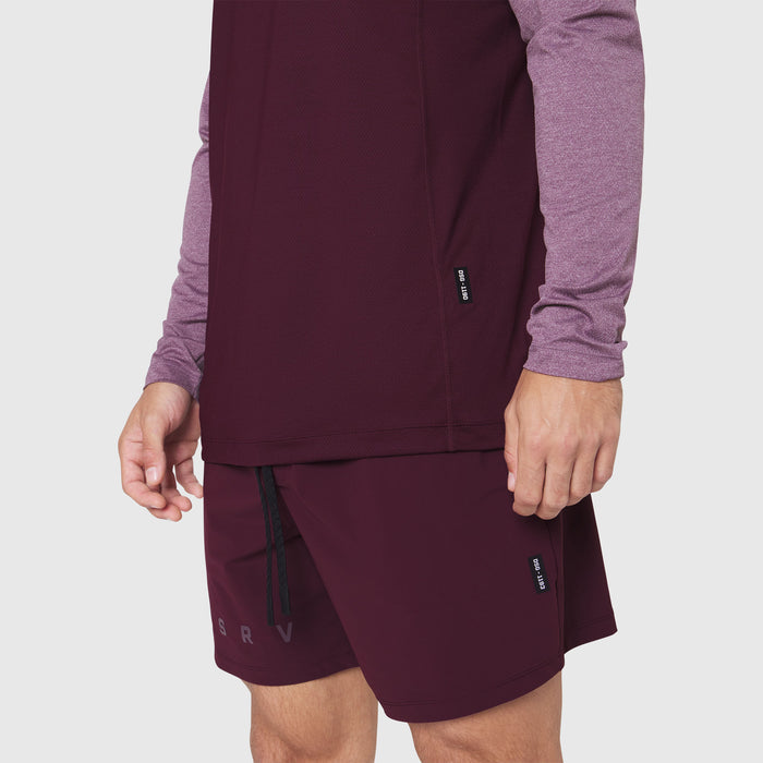 Revolutional Training Short in Merlot, worn by model showing front and side view