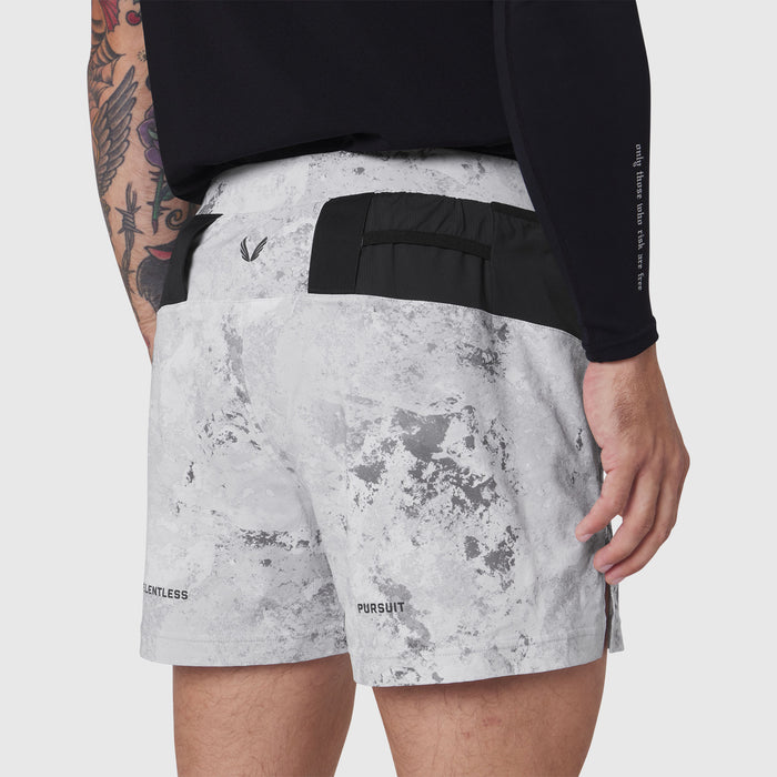 Aerotex Distance Run Short in Sedona Snow Camo worn by model, back view