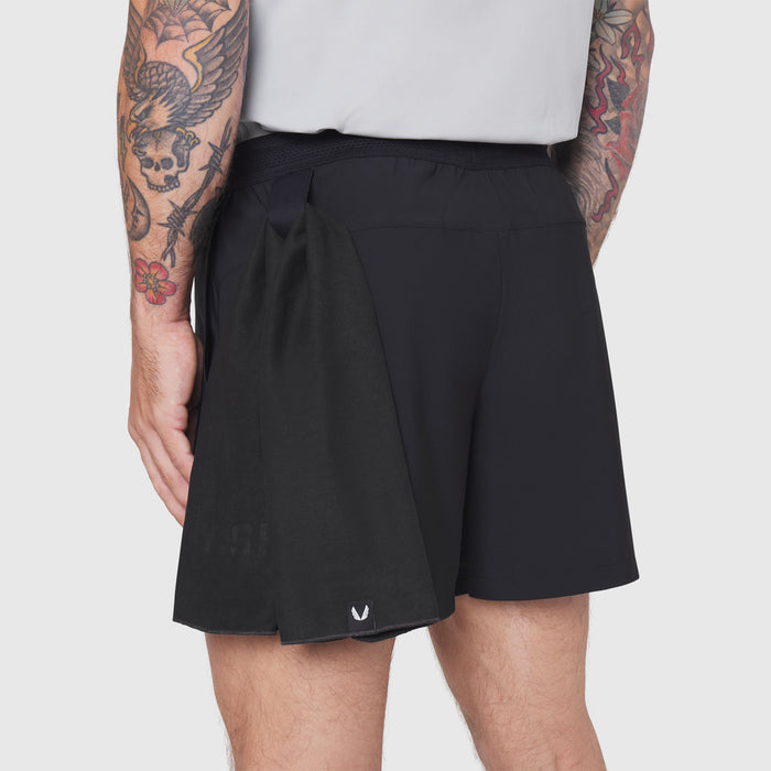 TETRA-LITE® 5" Linerless Training Short in black, worn by model, back view