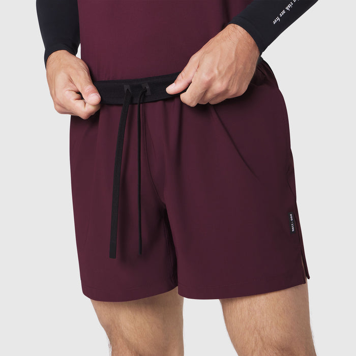 Tetra-Lite 5" training shorts in merlot, model adjusting waistband