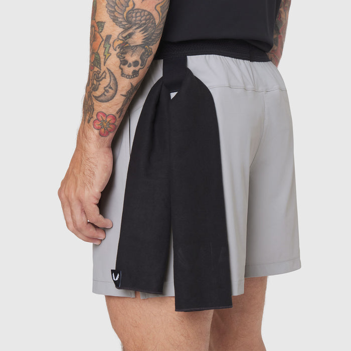 TETRA-LITE® 5" Linerless Training Short in slate grey and black, worn by model showing side view