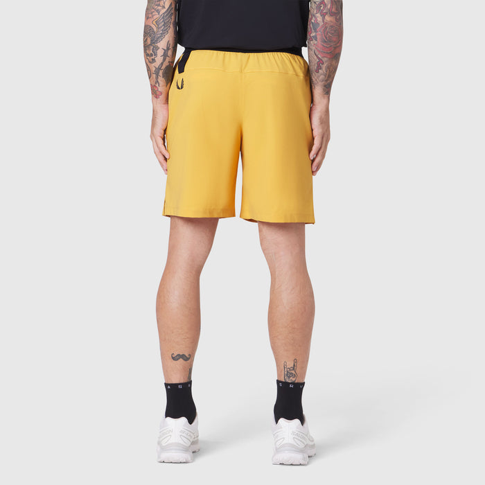 TETRA-LITE® 7" Linerless Training Short in amber, worn from behind