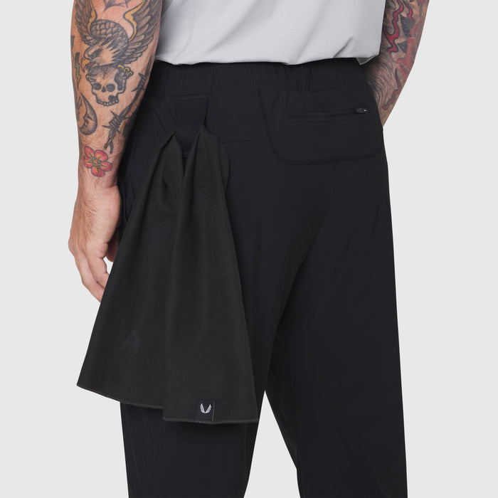 Black TETRA-LITE Training Jogger worn by model, back view showing fit and design details
