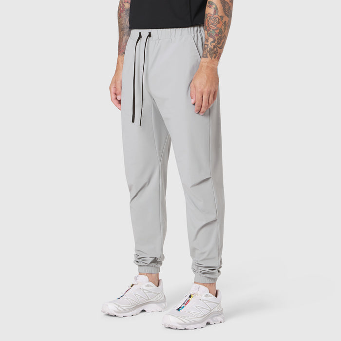 TETRA-LITE Training Jogger in slate grey worn by model, side view