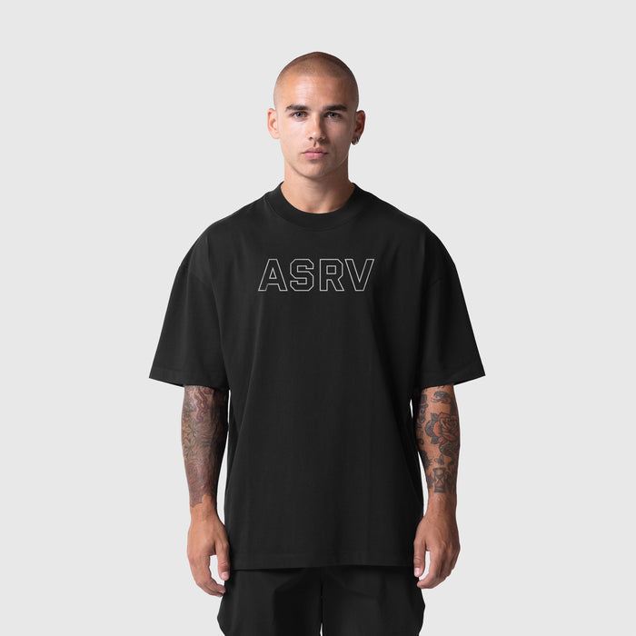 Model wearing ASRV Tech Essential Oversized Boxy Tee in Black Outline, front view