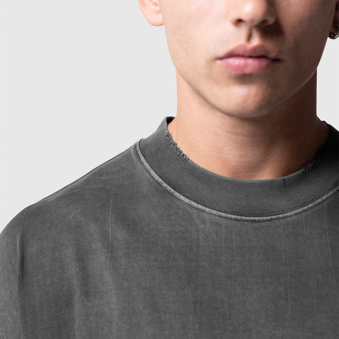 Model wearing Tech Essential™ Oversized Boxy Tee in Faded Grey, front view close-up shot