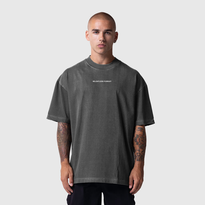 Model wearing ASRV Tech Essential Oversized Boxy Tee in Faded Grey, front view