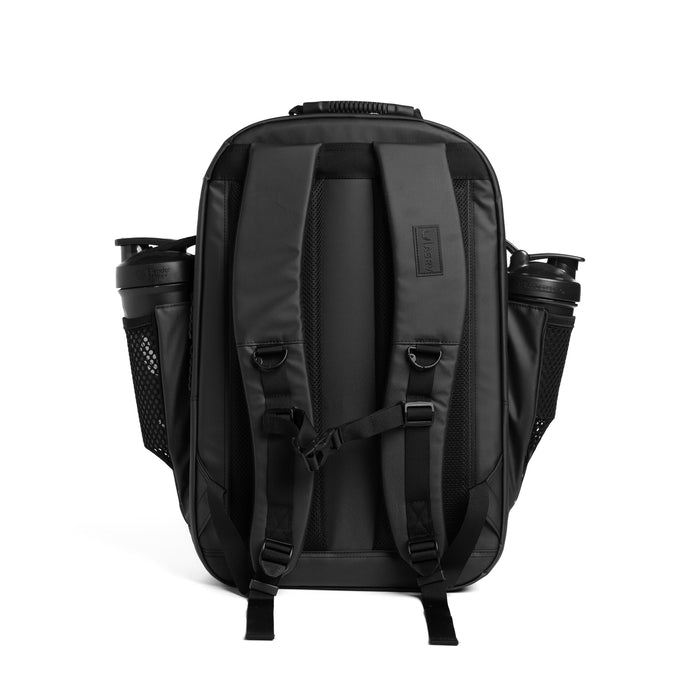 Flatlay Water Resistant Travel Backpack 30L in black, back view