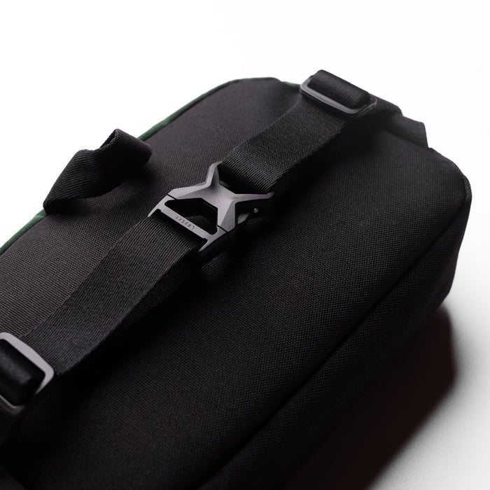 Flatlay 1231. Ripstop Crossbody Bag in Forest Green, top view with strap detail