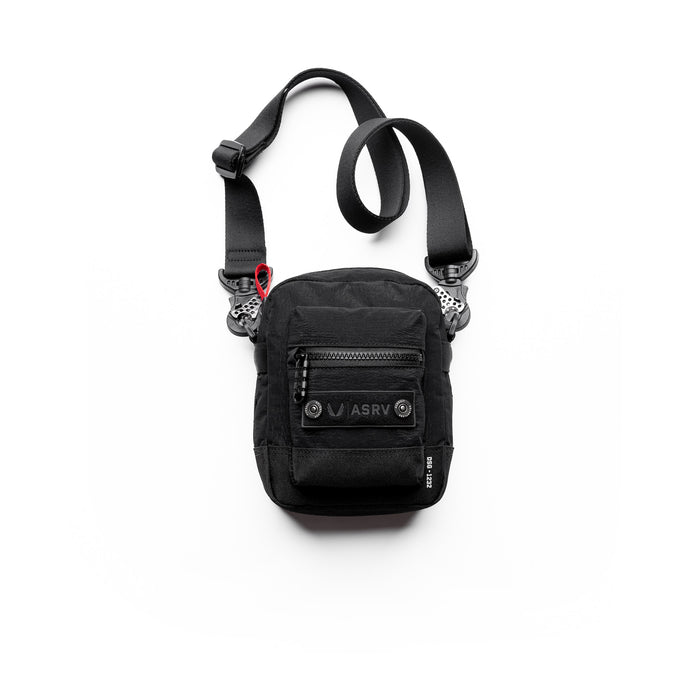flatlay ASRV Ripstop Shoulder Bag in black, front view against white background