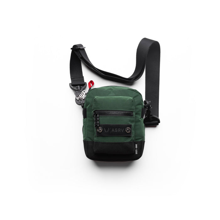 flatlay Ripstop Shoulder Bag in forest green and black, overhead view